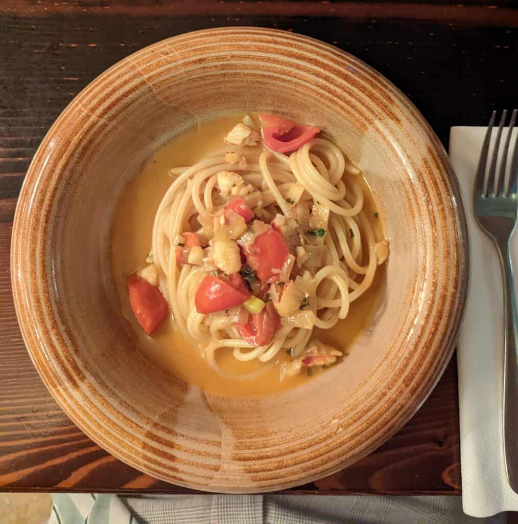 Lobster Spaghetti starter on plate with fork 