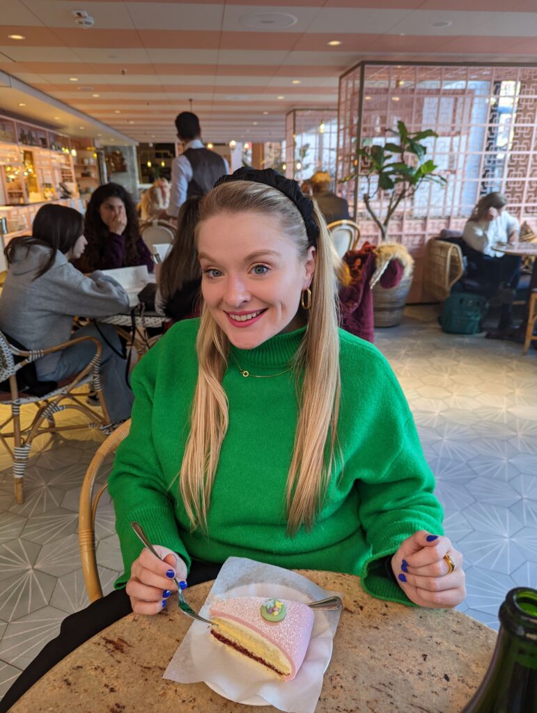 Steph having fika in Stockholm